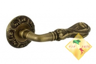 Ручка дверная на розетке LUXOR "ЛЮКСОР" MM 2104.21 бронза вестерн - фото 1